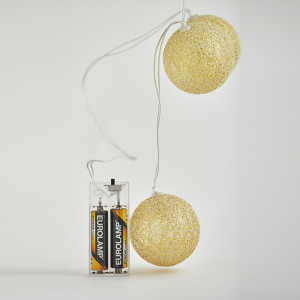 ΣΕΙΡΑ, 10 LED 5mm, ΧΡΥΣΕΣ ΥΦΑΣΜΑΤΙΝΕΣ ΜΠΑΛΕΣ 6cm,  ΜΠΑΤΑΡΙΑΣ 2xAA, ΧΡΟΝΟΔΙΑΚΟΠΤΗ, ΔΙΑΦΑΝΟ PVC ΚΑΛΩΔΙΟ, ΘΕΡΜΟ ΛΕΥΚΟ ΑΝΑ 15cm, ΠΡΟΕΚΤΑΣΗ ΠΑΡΟΧΗΣ 30cm, IP20